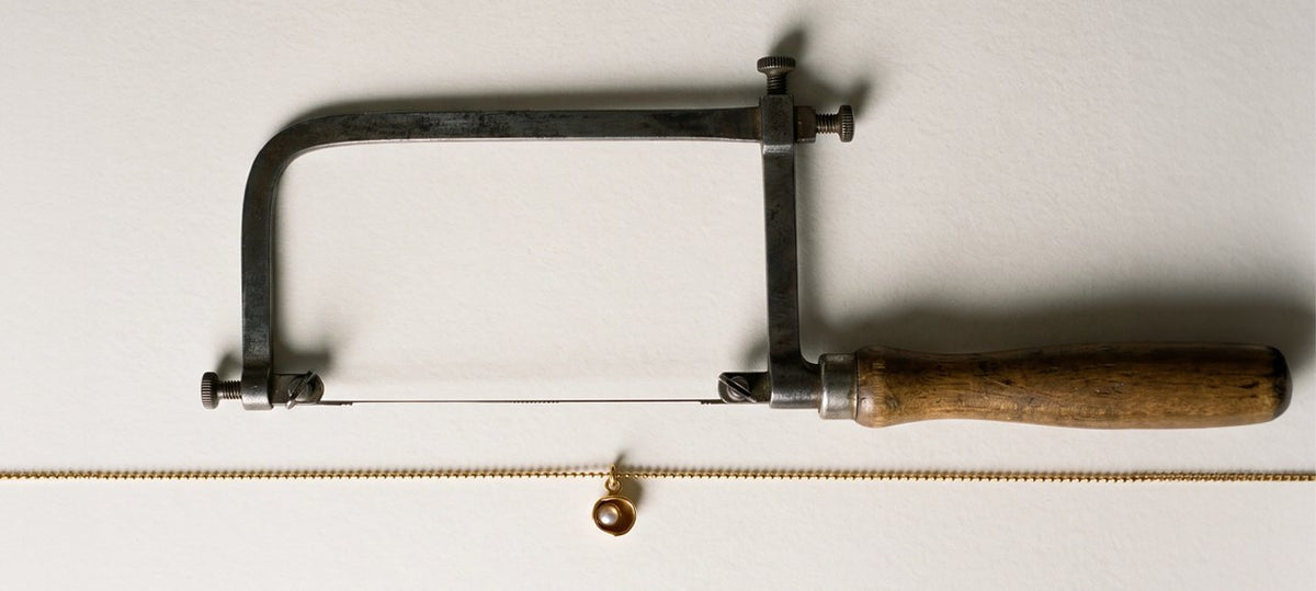 Jeweller’s saw and Apreels chain
